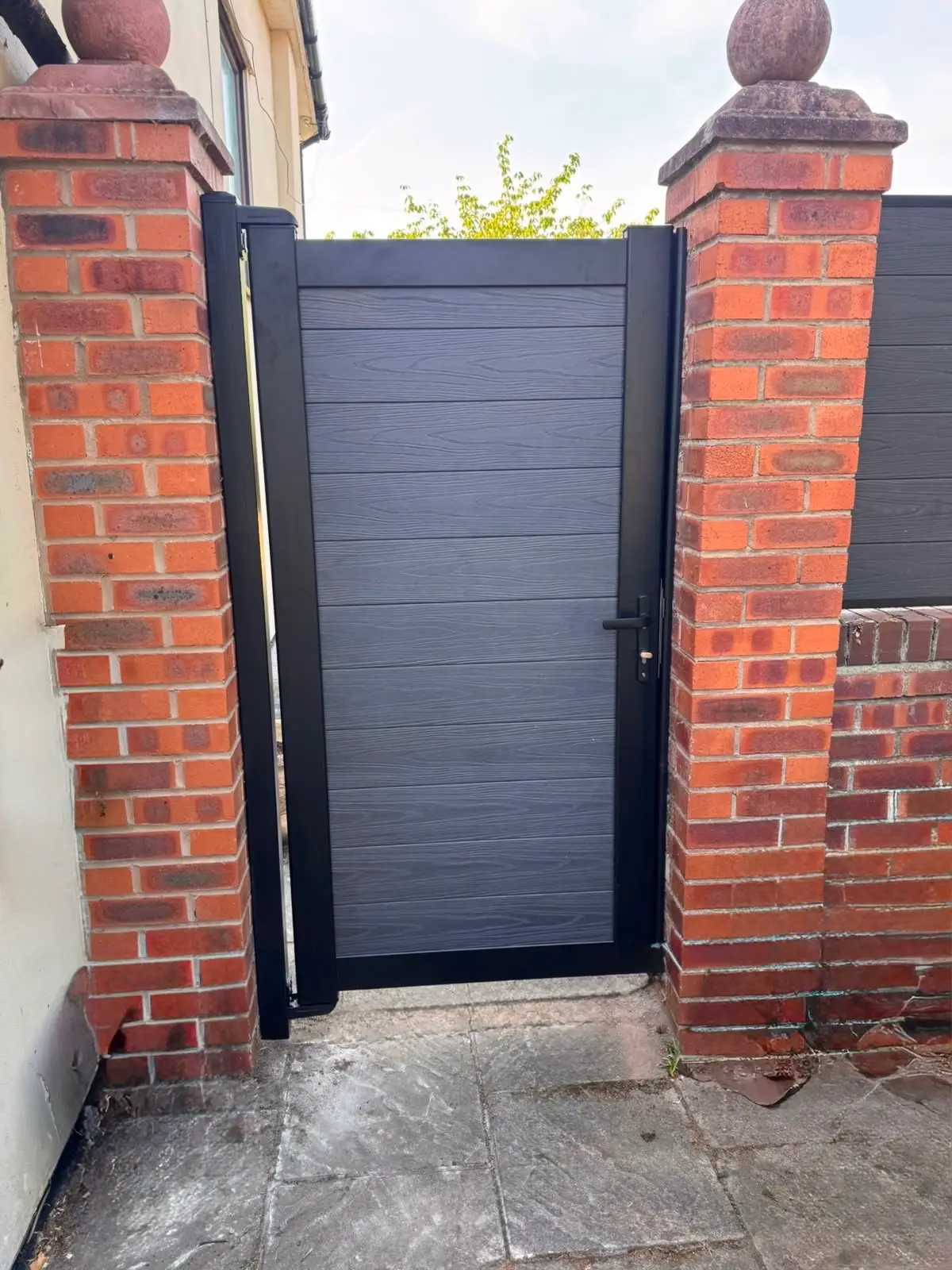 Composite Fences Liverpool composite side gate between brick pillars.jpg