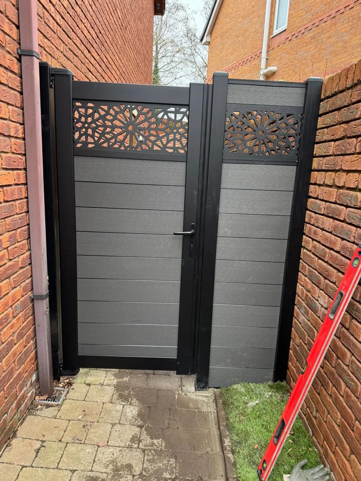 Weatherboard Fencing grey composite side gate installation.jpg